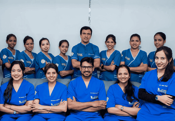 Dr. Aslam and Team blue scrubs