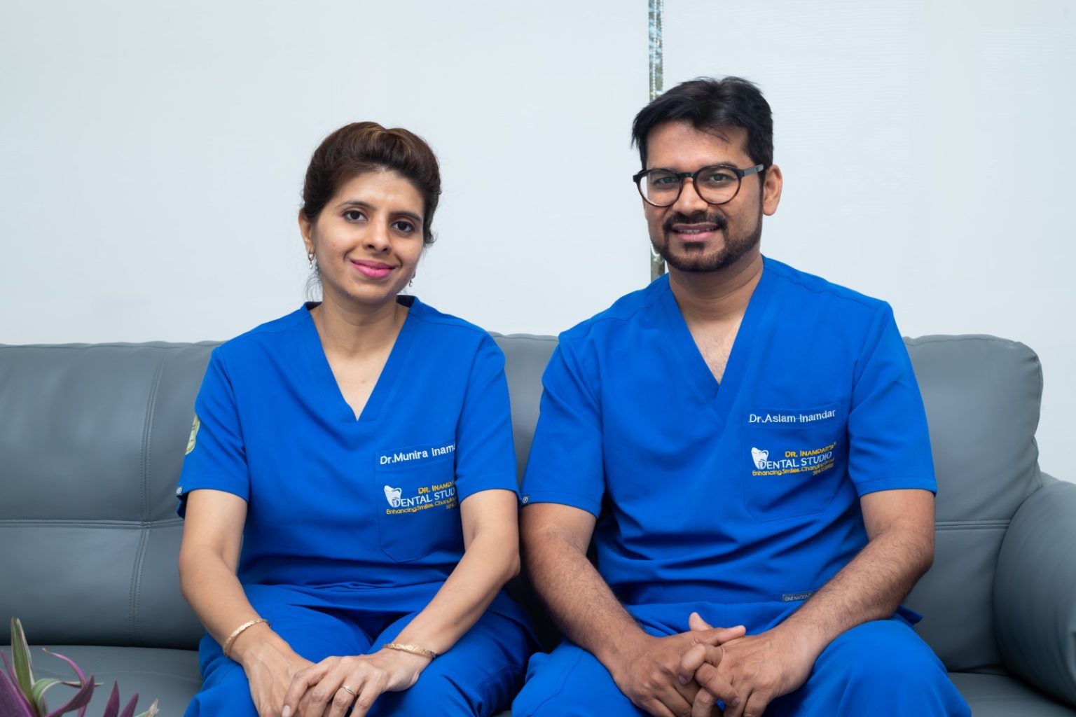Dr. Munira and Aslam Inamdar sitting together on a sofa