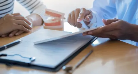 Does Insurance Cover Dental Implants and Veneers in India